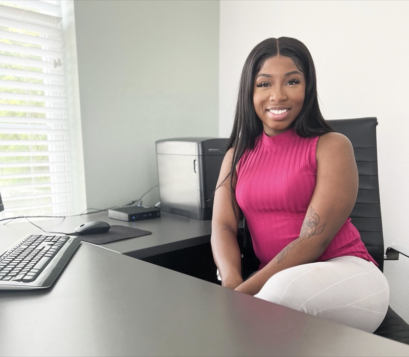 Kalynn Wilson at the desk where Vitals Digital is built.